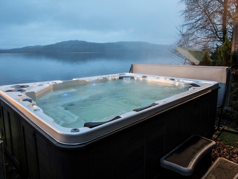 Waterside Self Catering Lodges and Cottages Overlooking Loch Lomond in Scotland with Hot Tub